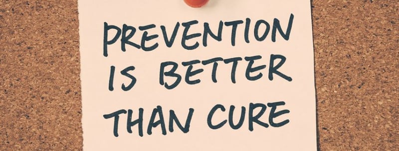 Post it note reading 'prevention is better than cure'