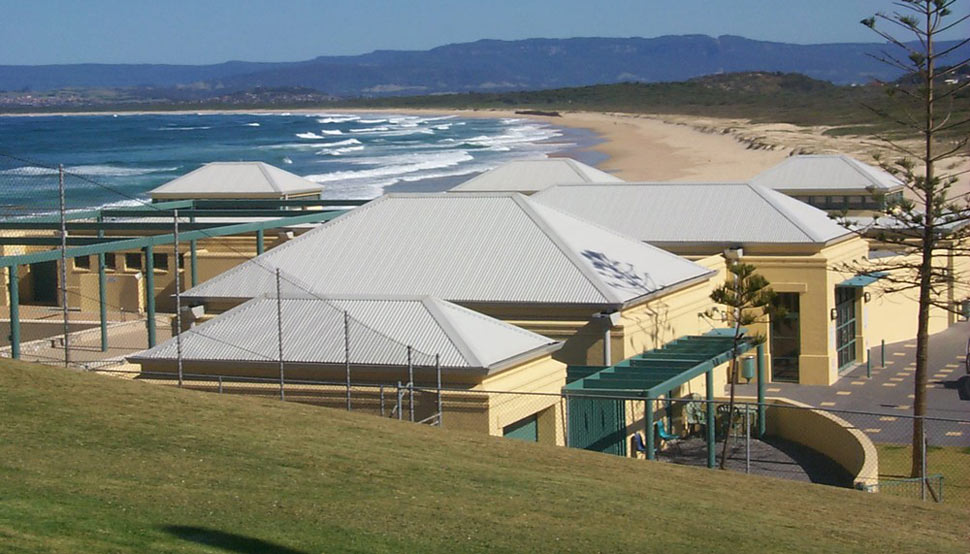 Buildings with metal roofs on beach