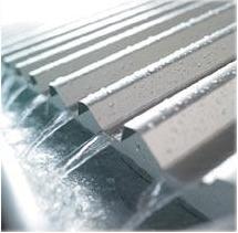 Metal Roofing - Brisbane - 10 Benefits of a Colorbond Roof: What you need to know! It's lightweight water running off roof sheet into gutter
